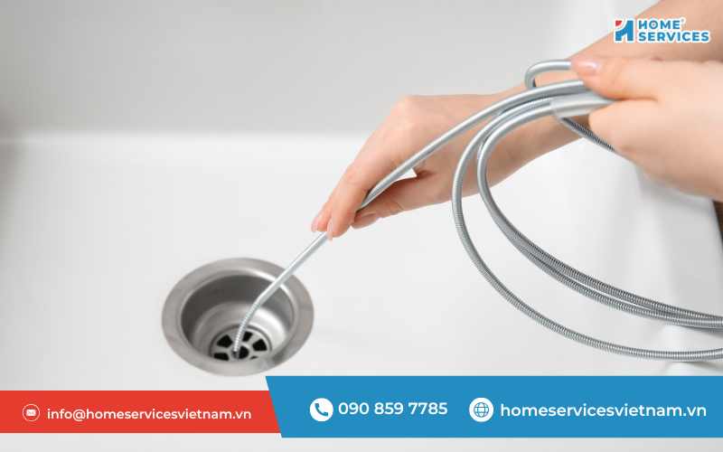 Cách thông cống nghẹt bằng dây lò xo