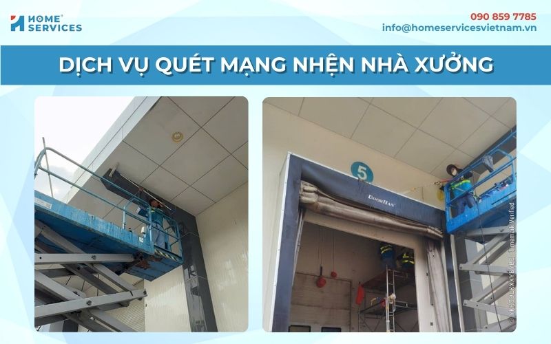 Nhân viên dùng thang nâng quét mạng nhện nhà xưởng